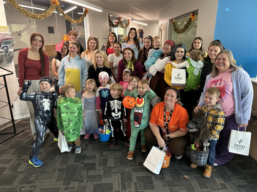 Small Wonders preschoolers trick or treating throughout the halls! 