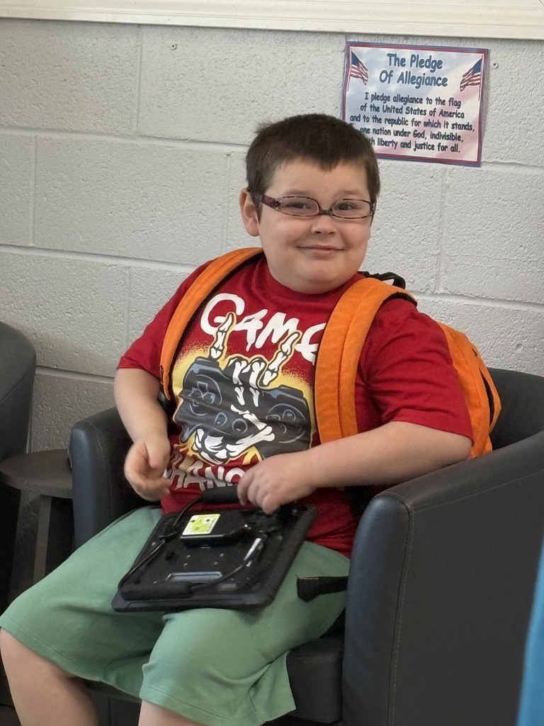 "Asked to hold the teacher's glasses. Decided to wear them upside down instead. First grade problem-solving at its finest!" 😄