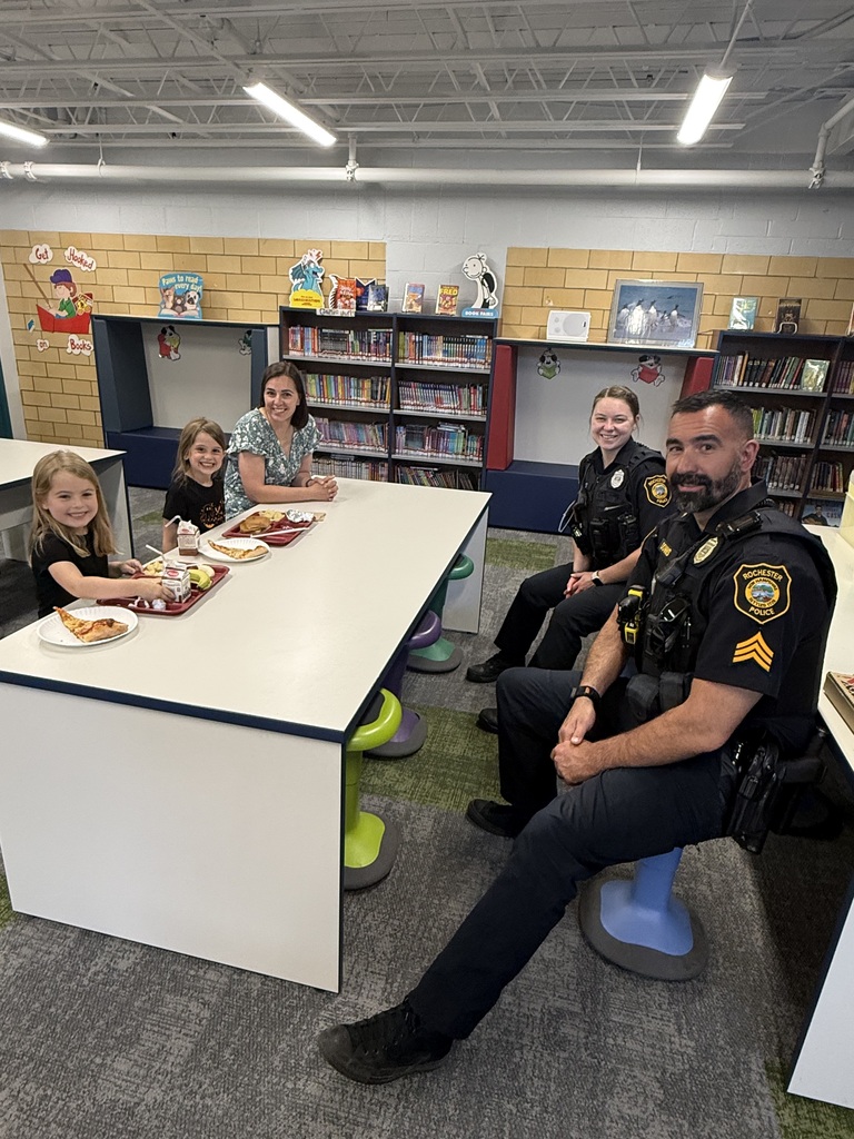 Mighty Macs enjoying lunch with Police Officers