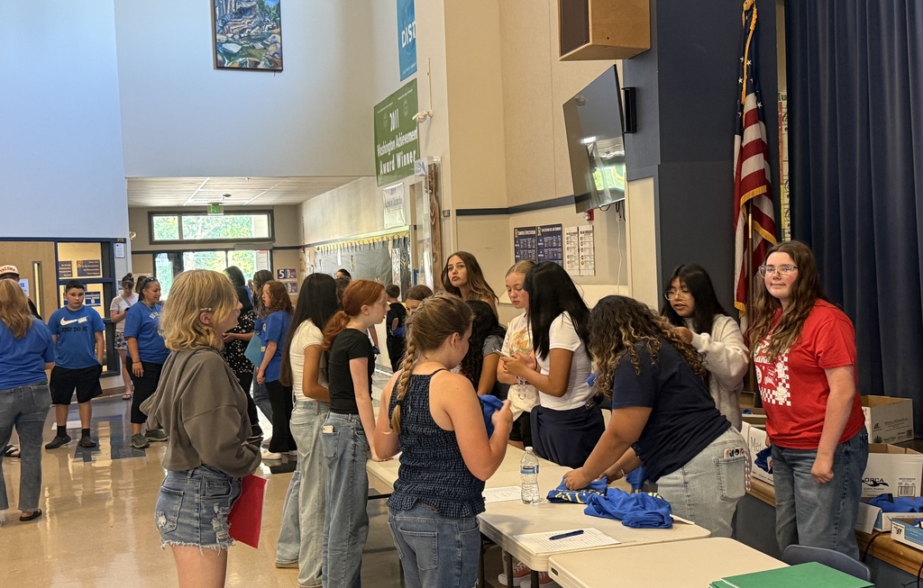 Students getting their t-shirt