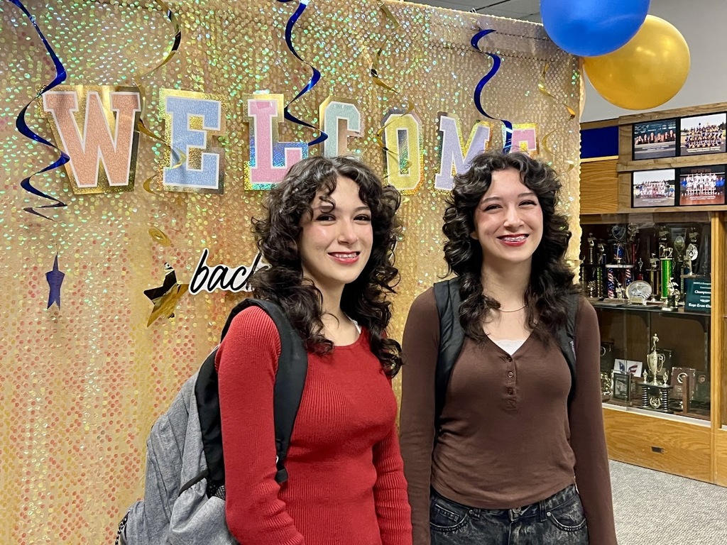 two girls smiling
