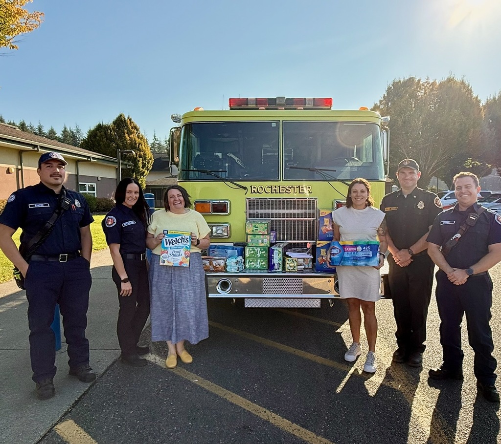 Ms. Cearns & Ms. Kernutt accepting donation from WTCF