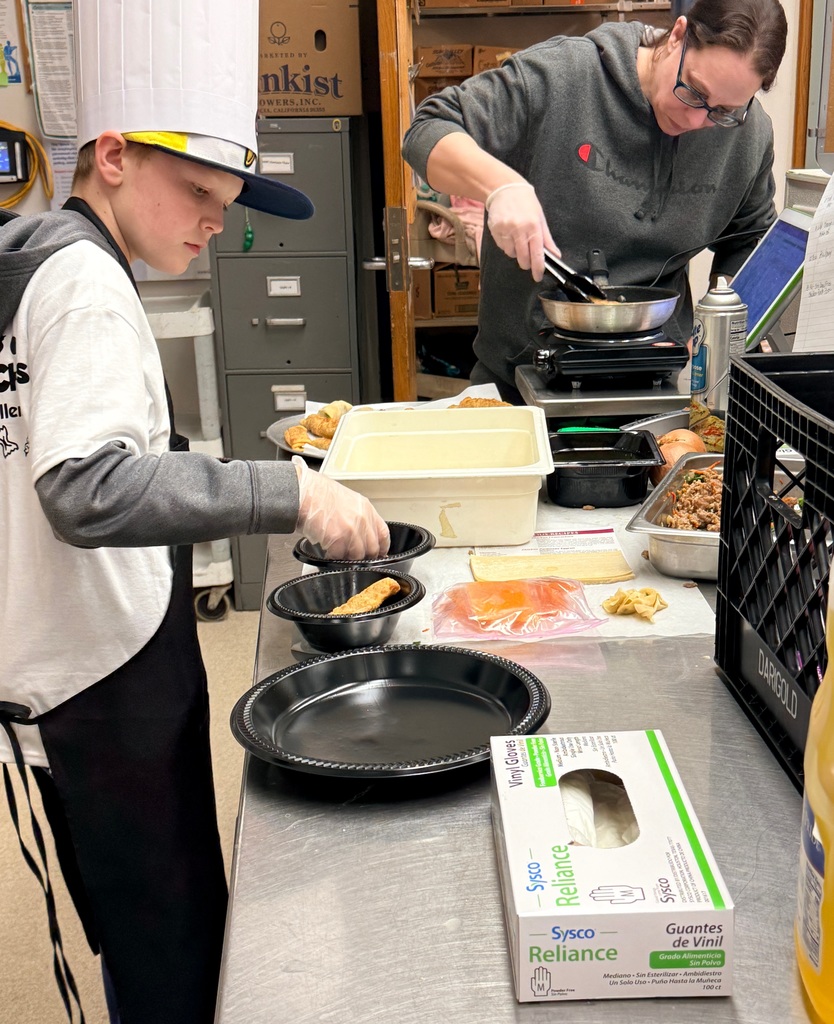 Student making Lumpia