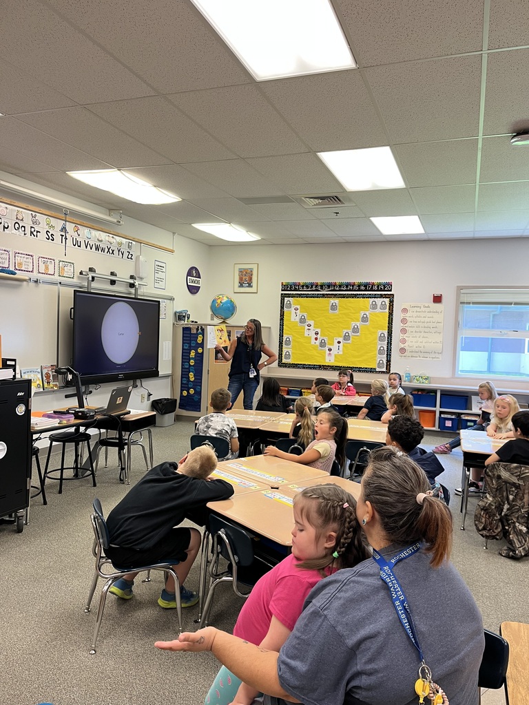 Mrs. Simmons reading to the class. 