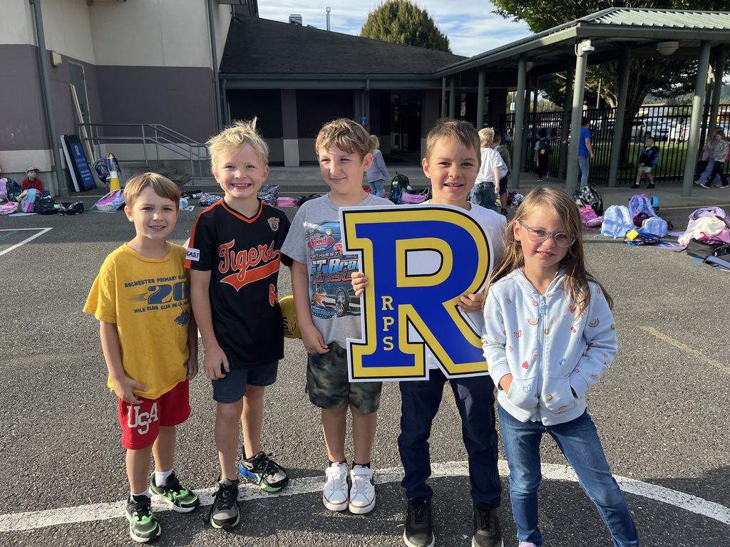 Students at Recess holding our RPS "R"