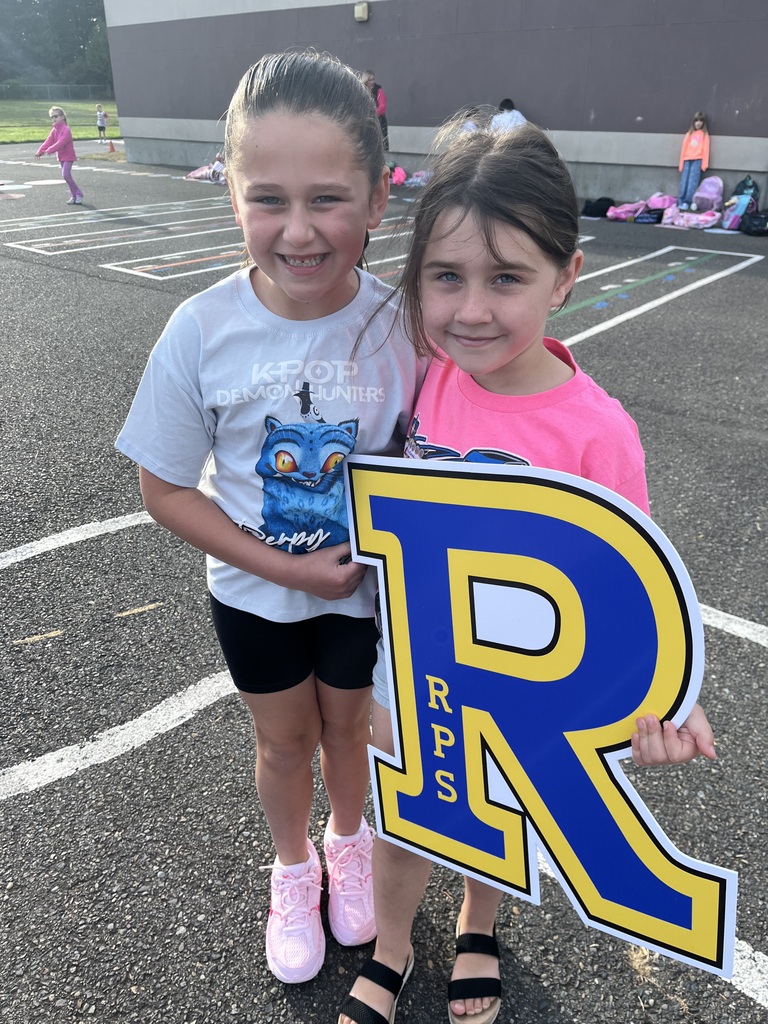 Students at Recess holding our RPS "R"
