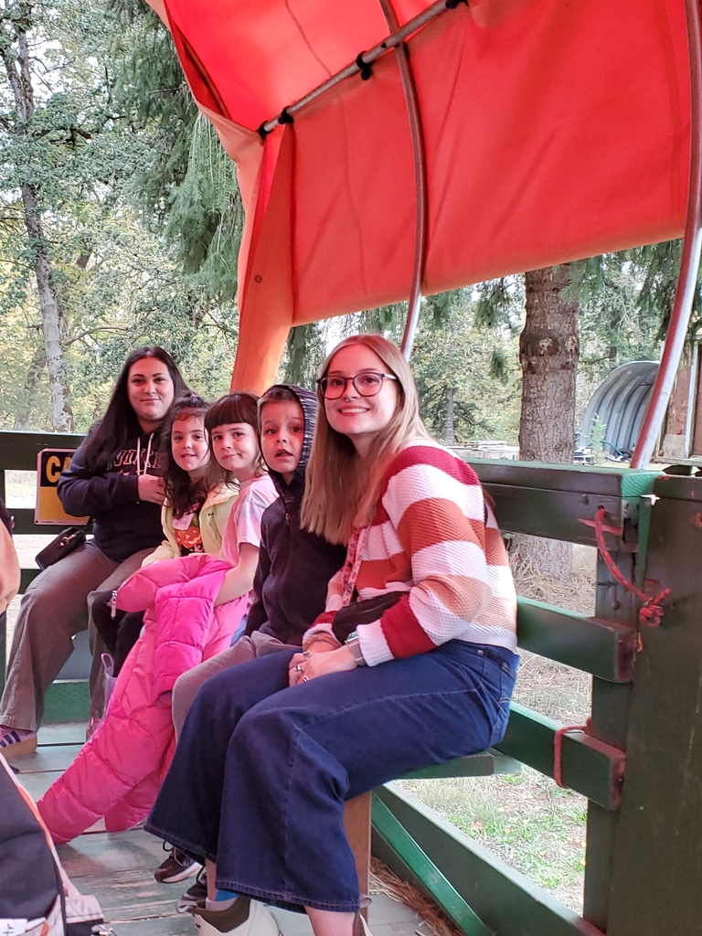 Kindergartners on tractor wagon.