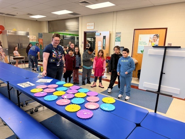 Penny Pitch Game in the Cafeteria