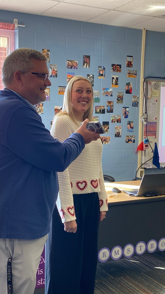 Mr. Steve Splichal on the phone with Randy Watson, KSDE, sharing the good news that Ms. Armstrong has received the Horizon Award this morning !