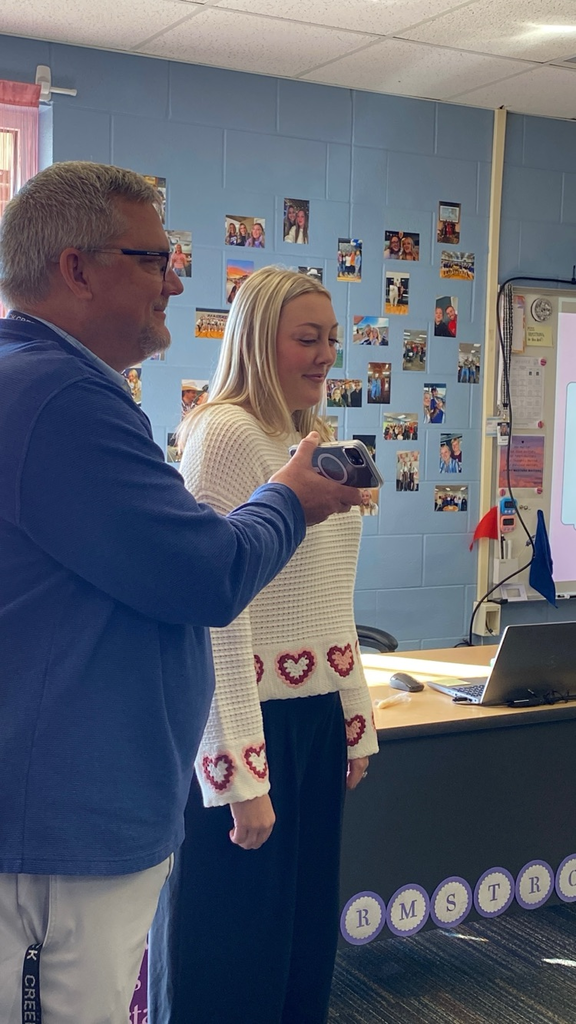 Mr. Steve Splichal on the phone with Randy Watson, KSDE, sharing the good news that Ms. Armstrong has received the Horizon Award this morning!