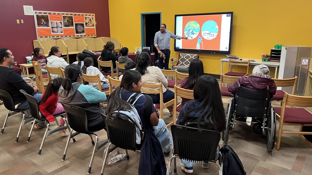 Students and their parents in audience