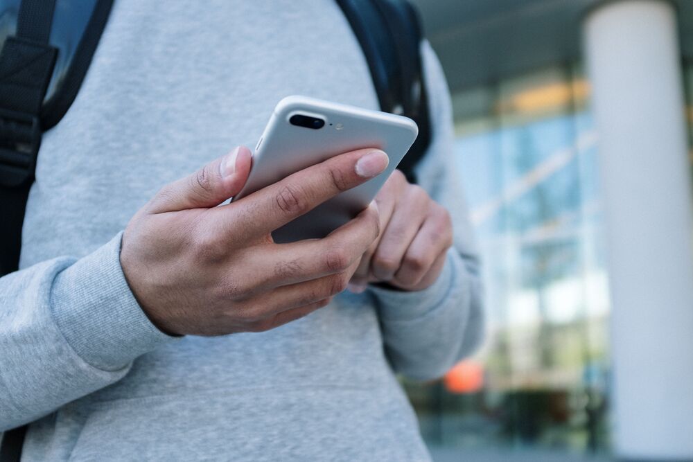 Student holding Cellphone