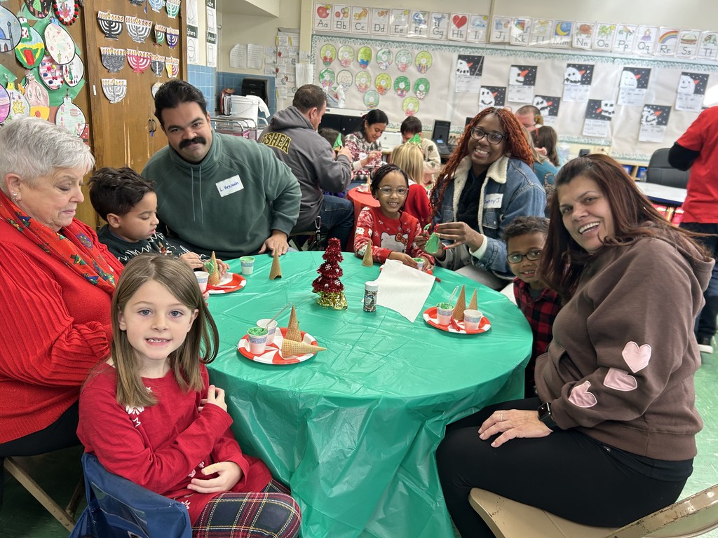 Parents and family members were invited into the classroom to take part in a shared learning experience with their students. Ms. Blue, Ms. Haas, Ms. Hempel, and Ms. Mojica facilitated an activity in which students presented decorated ornaments that represented their family traditions. The celebration continued as families worked with their student to create gingerbread trees, creating lasting memories. Kudos to our teachers, students, and families for coming together to build a more seamless school to home connection!