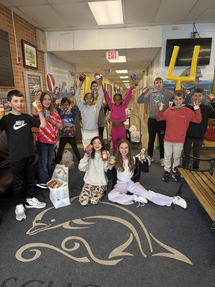 students posing with the van that would take the cans donations - Thank you to Mr. George and Mr. Chris for delivering the Student Council Souper Bowl collection to the Rockaway Food Pantry! Close to 400 non- perishables were collected! Thank you Stony Brook! #sbrt🐬