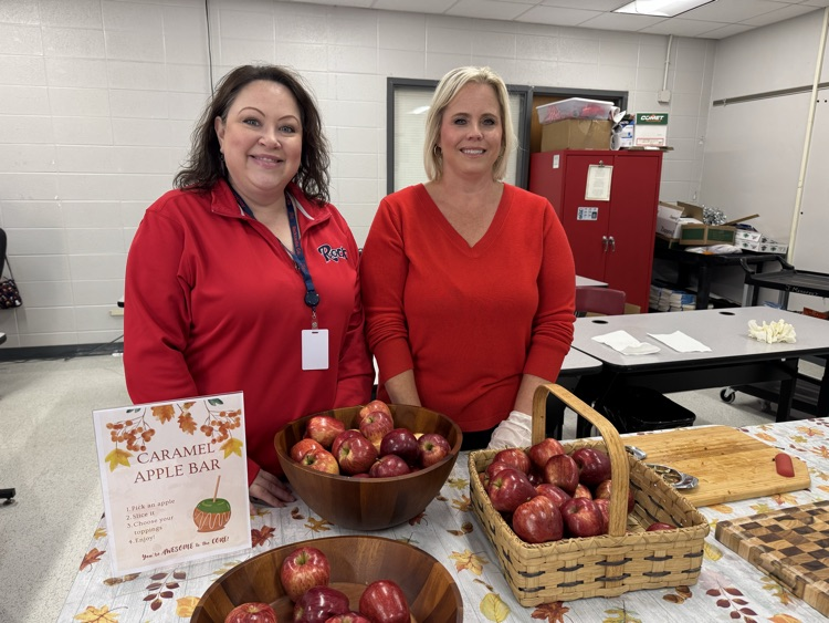 Teachers with apple bowls