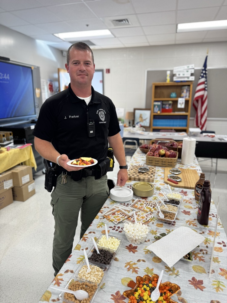 Teachers with apple bowls
