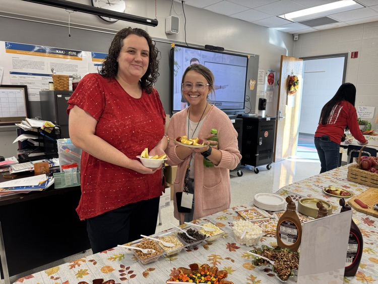 Teachers with apple bowls