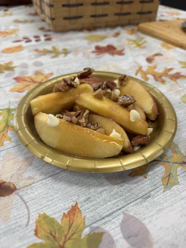 A sliced caramel apple