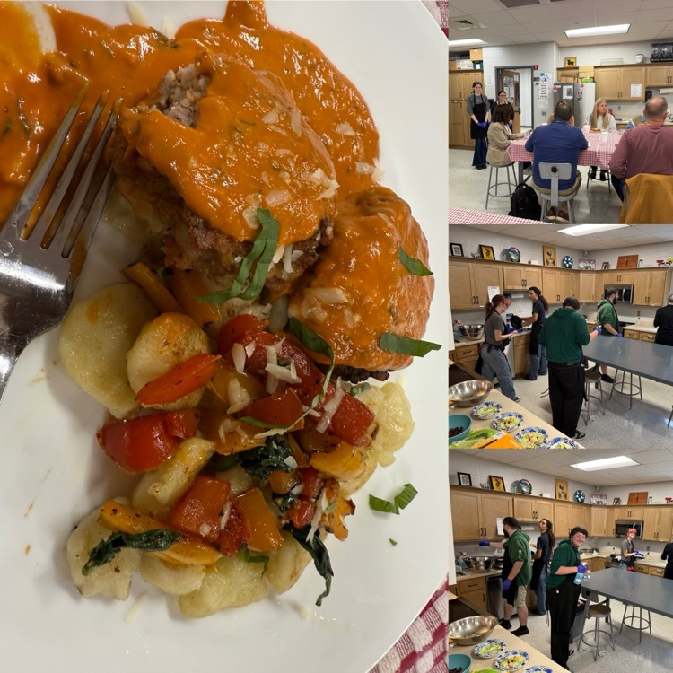 A plate with gnocchi, sausages, and a tomato sauce