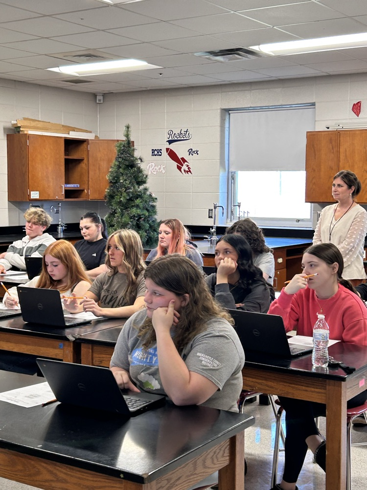students sit at computers
