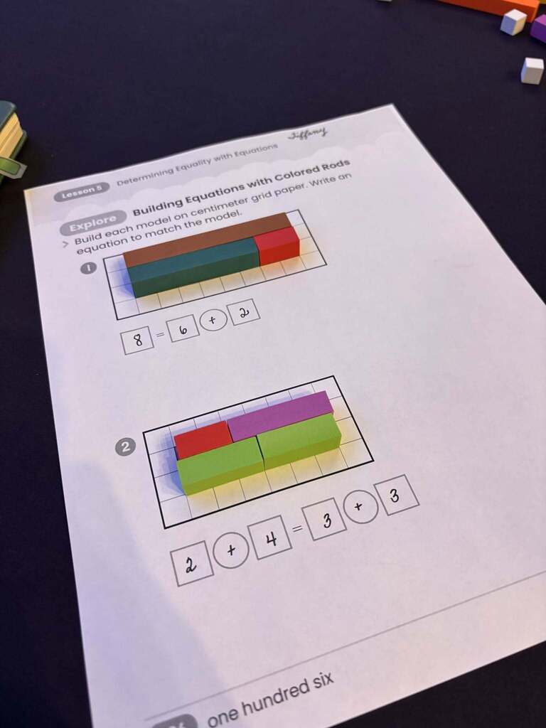 Picture of math adding cubes and activity sheet.