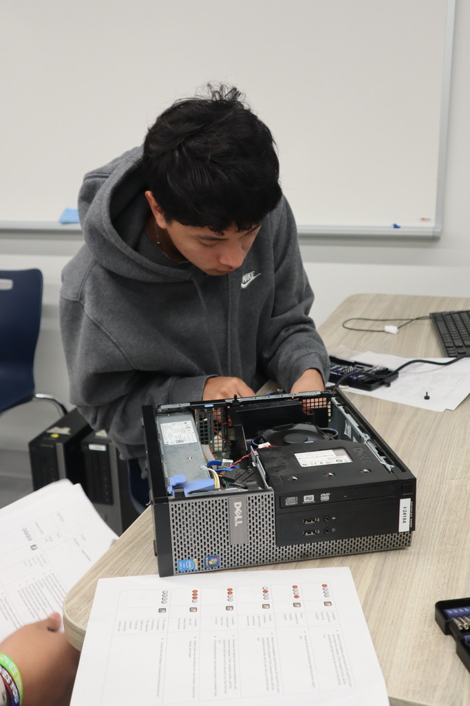 Student working on a computer monitor