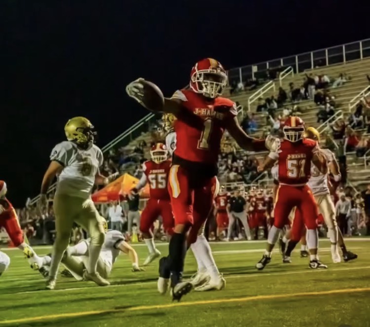 DeAnglos Roby runs in a touchdown during Jefferson’s 13 to 7 victory over Boylan. Photo by Christian Klasnja.