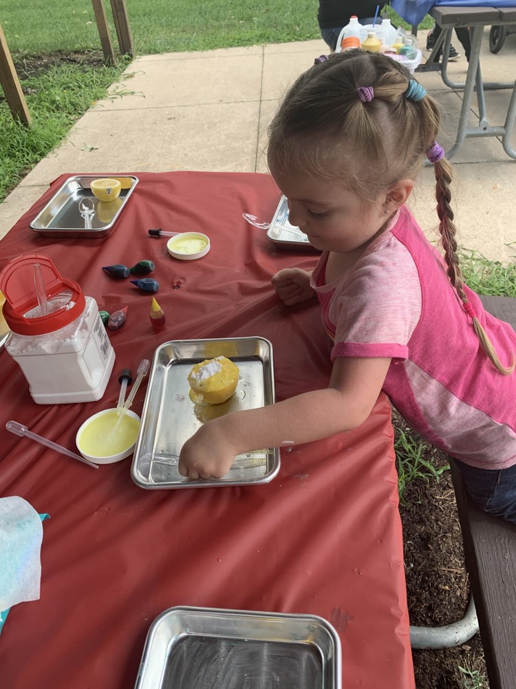 child wtih lemons