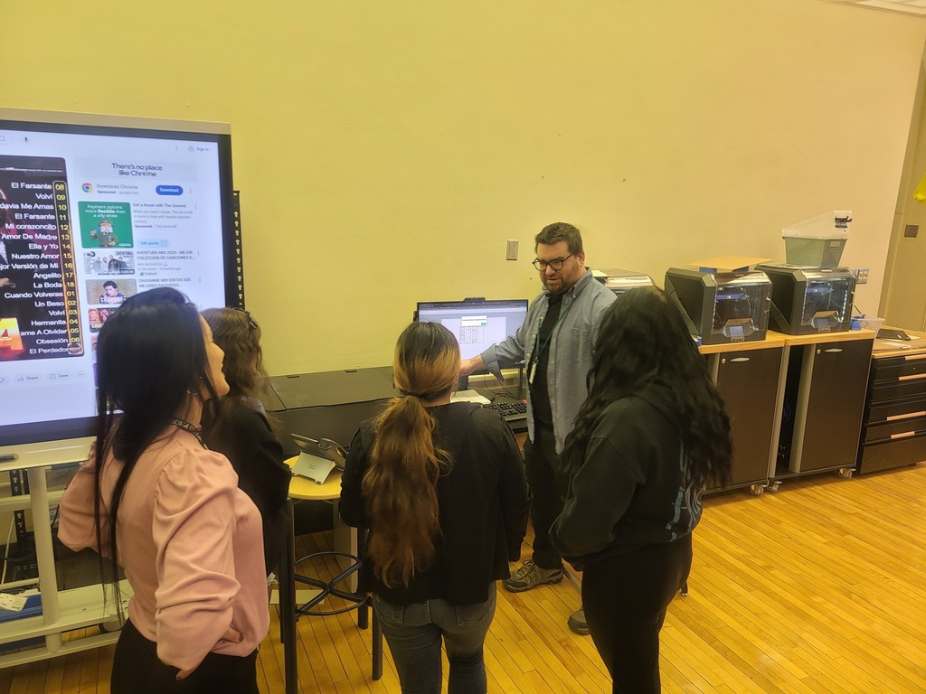 Here is Greg Johnson showing a group of students our 3D printer and Laser Engraver.