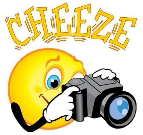 Smiley face with camera saying cheeze