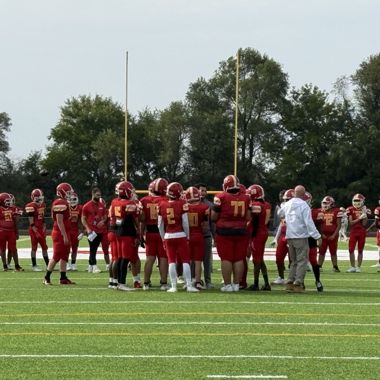 JV warms up on the turf field