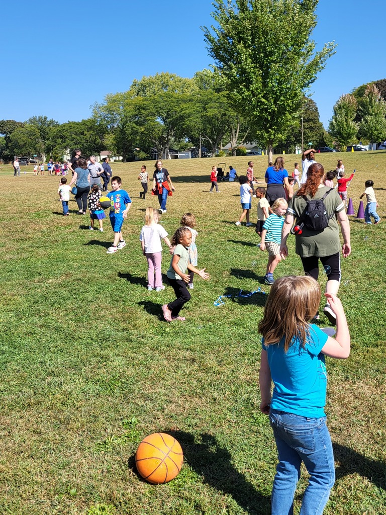 Students playing in a field.