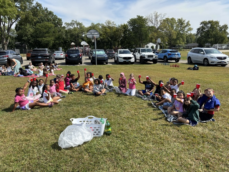 class enjoying a picnic