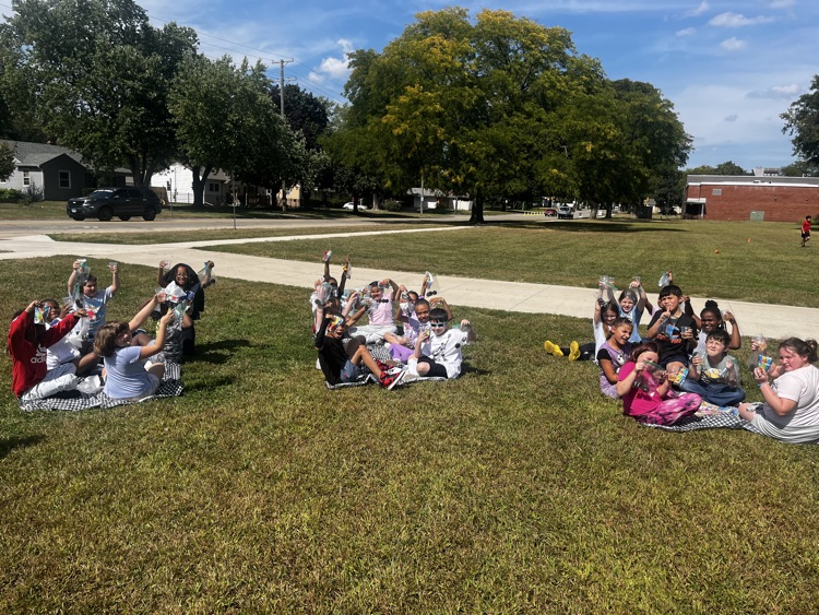 class enjoying a picnic