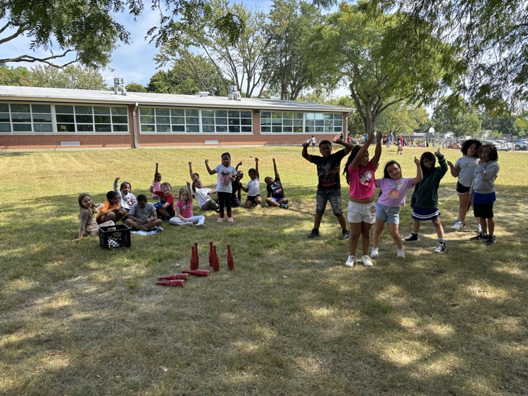 students playing skittles