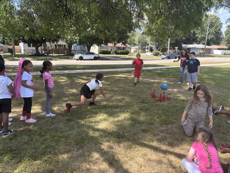 students playing skittles