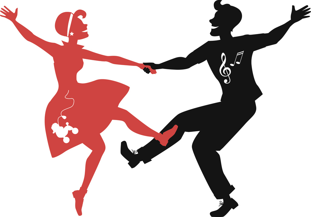 Girl and boy dancing in fifties style clothing