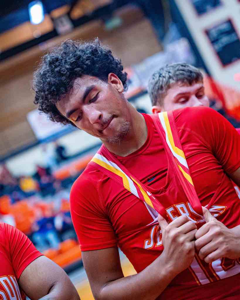 Student is grabbing onto their shirt.