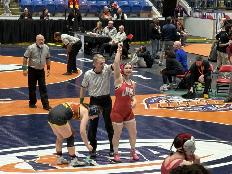 Referee raises Eilken’s arm to signal victory