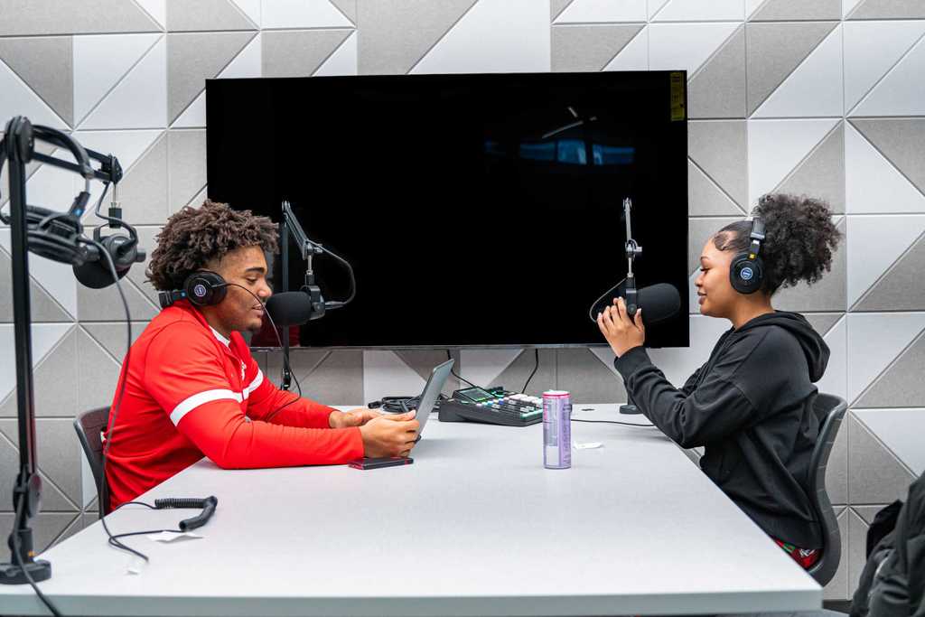 Side shot of student responding to question