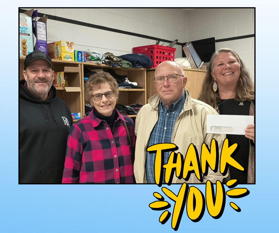 Ms. Dean accepting the donation from Bridgewater Church of the Brethern