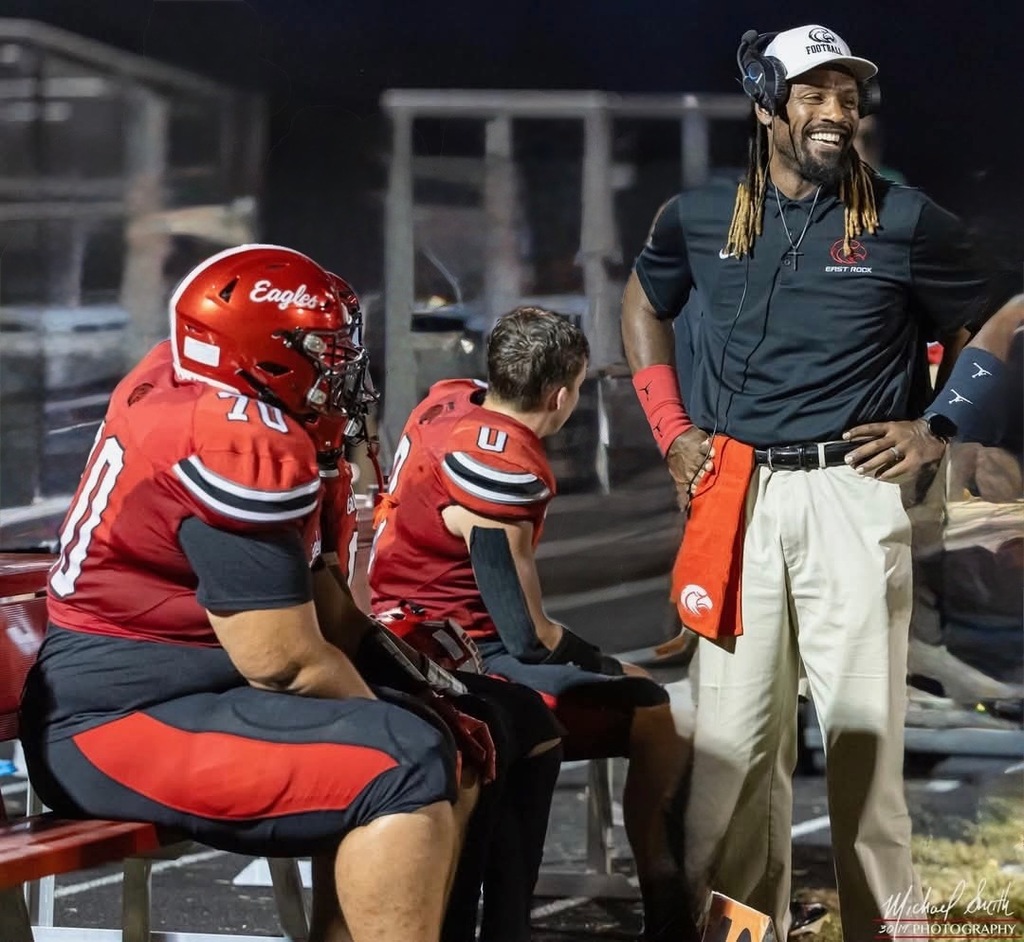 Coach Dontae' Gholson with players