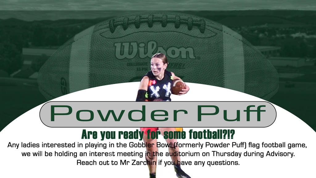 A player holds a football in front of a banner. The banner reads "Powder Puff" and asks if one is ready for football.