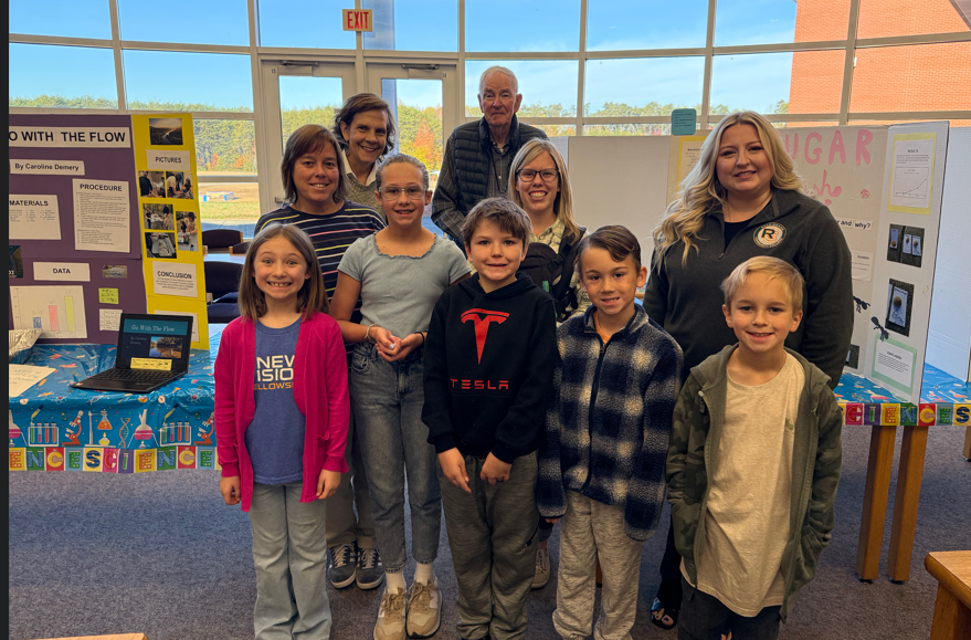 kids and adults standing