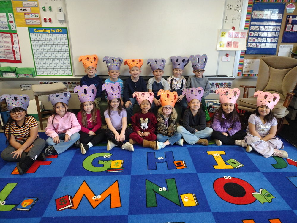 children sitting on rug