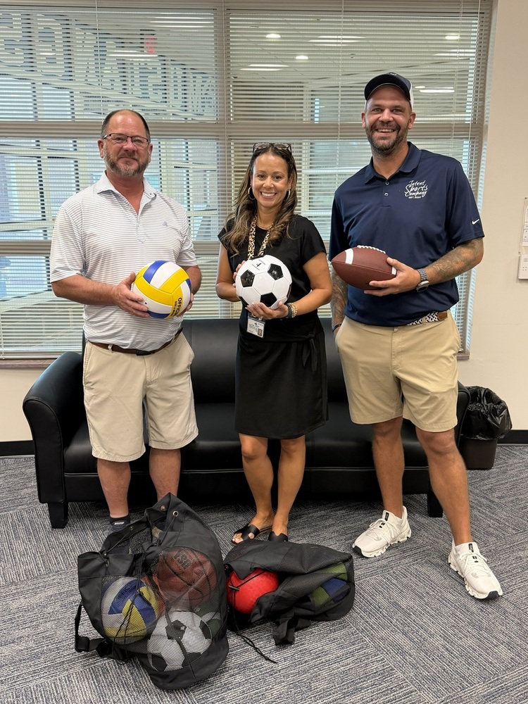 Mr. Todd Madren, Mr. Chris Whitesell, and Principal Slade at Monroeton Elementary gifting new sports equipment for student recess