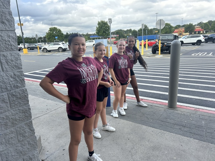 cheerleaders at stuff the bus
