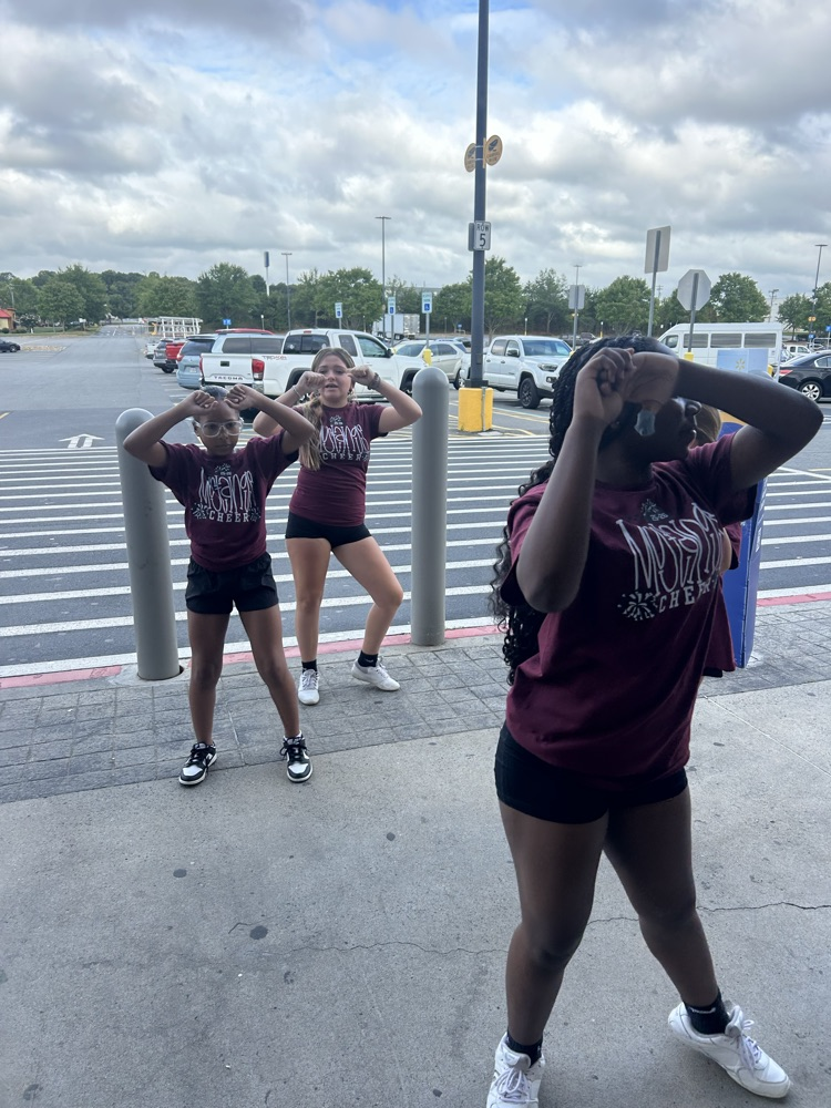 cheerleaders at stuff the bus