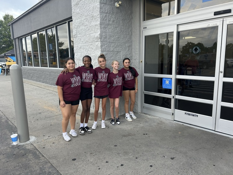 cheerleaders at stuff the bus