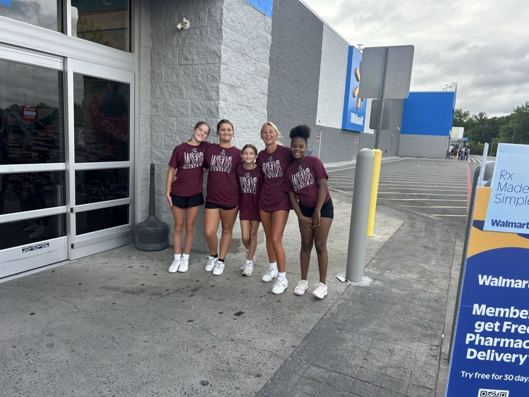 cheerleaders at stuff the bus